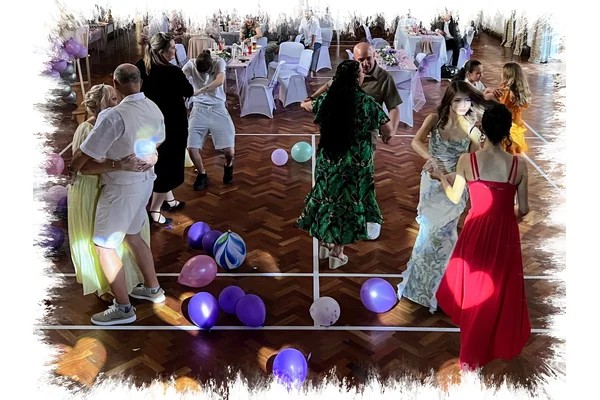 Wedding guests dancing at a JMF Disco wedding in Canterbury