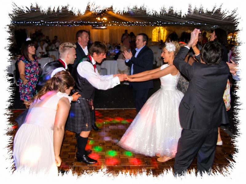 Wedding guests dancing at The BarnYard near Upchurch