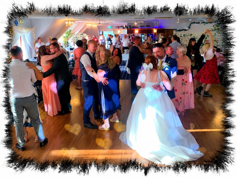 Wedding guests dancing at River Valley Golf Club in Upchurch
